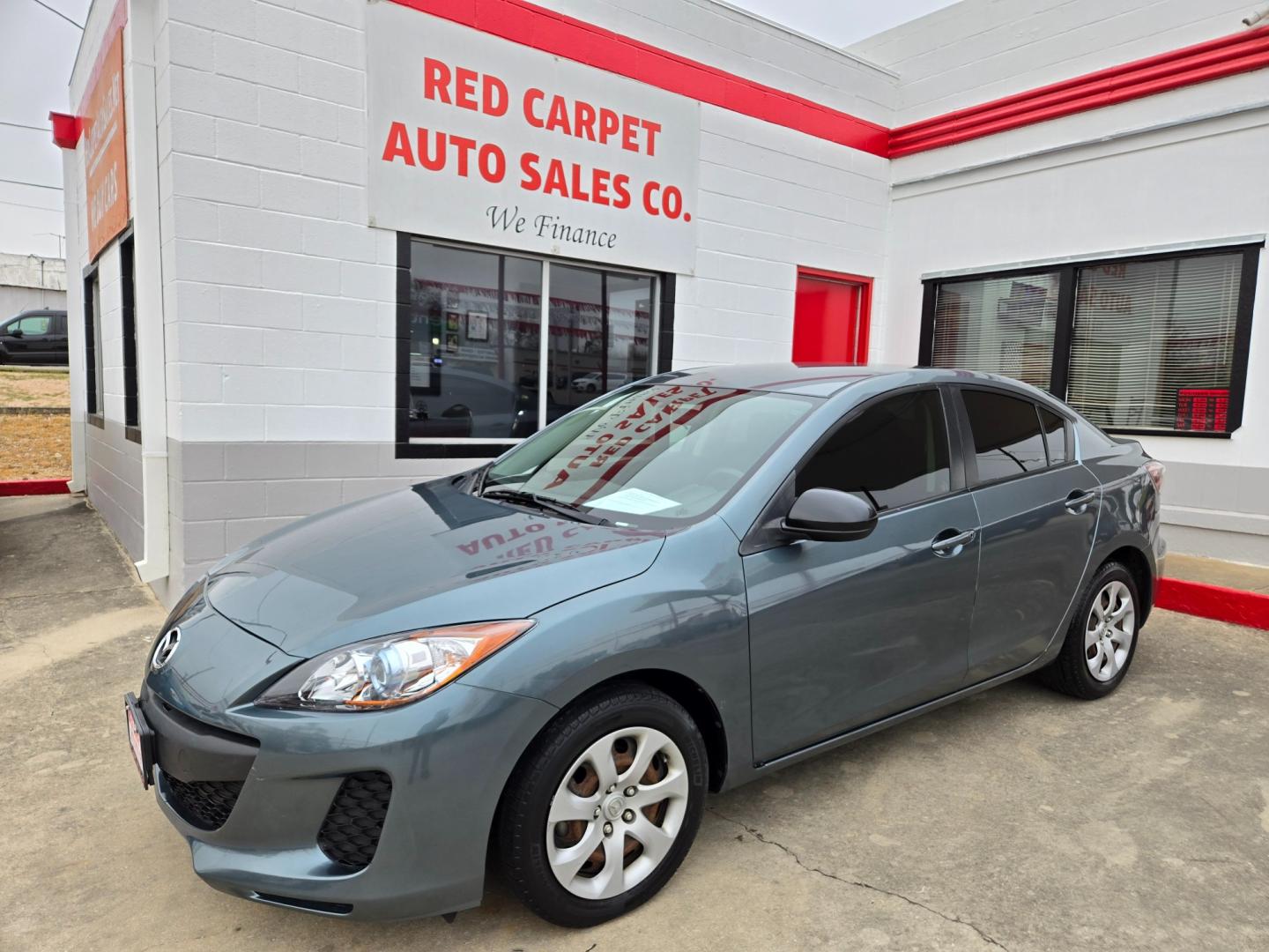 2013 Blue Mazda MAZDA3 (JM1BL1U78D1) with an 2.0L I4 F DOHC 16V engine, Automatic transmission, located at 503 West Court, Seguin, TX, 78155, (830) 379-3373, 29.568621, -97.969803 - Photo#0